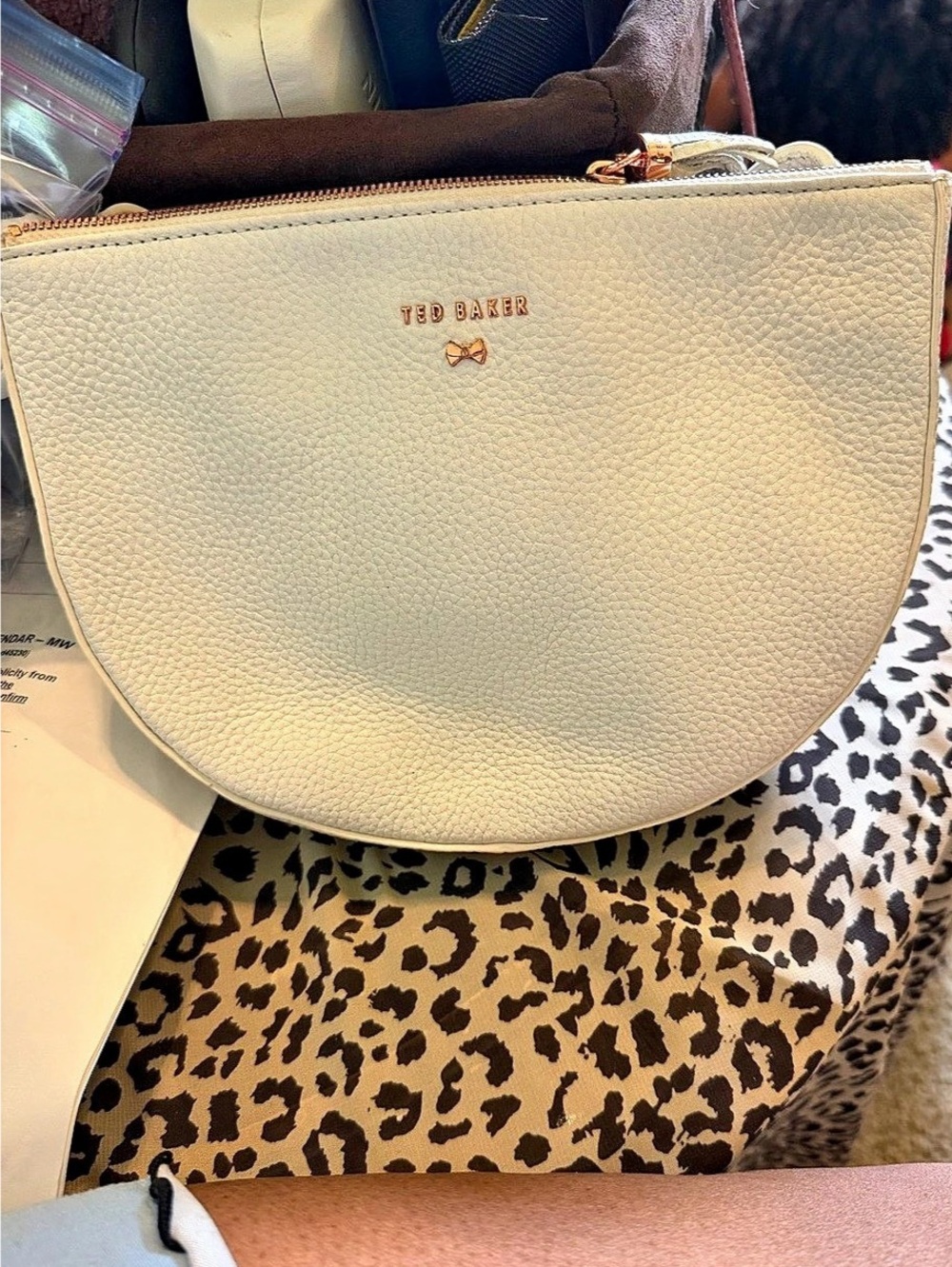 Ted Baker London pebbled leather semi-circle crossbody bag